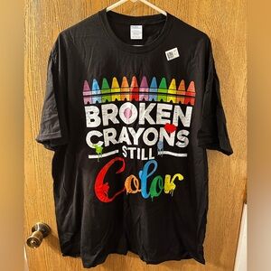 Black shirt with Broken Crayons still color on the front
